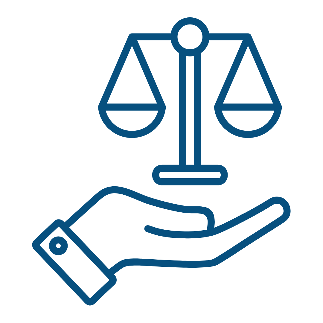 Hand below scale of justice
